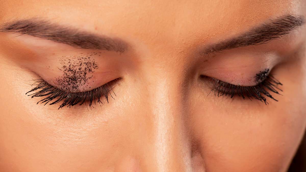Mascara smudges on eyelids