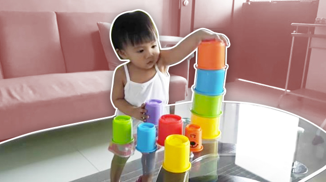 child stacking cups