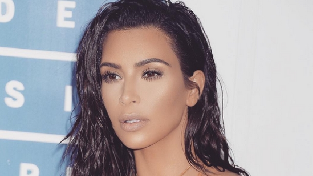 Kim Kardashian Flaunts Her Midnight Spray Tan Via Nude Selfies