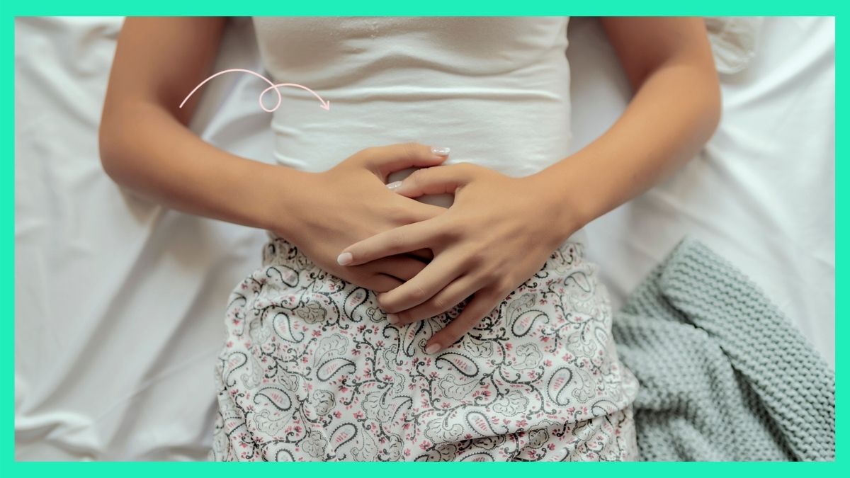 PCOS questions: woman holding her stomach