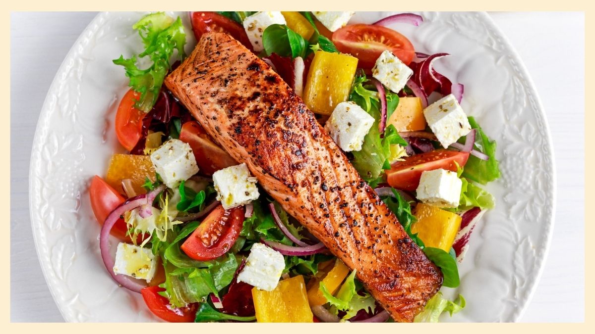 endometriosis diet: salmon on top of a salad