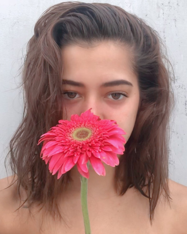 How To Pose With A Flower Stem For Instagram