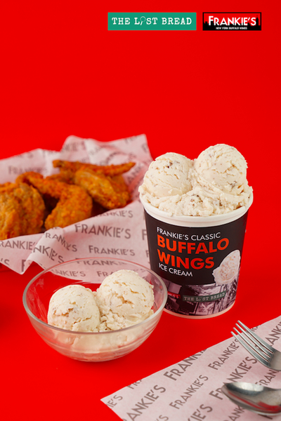 Buffalo Wings Flavored Ice Cream serverd in a bucket with chicken wings