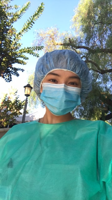 Grey's Anatomy background actor: Laureen Garcia wearing scrubs