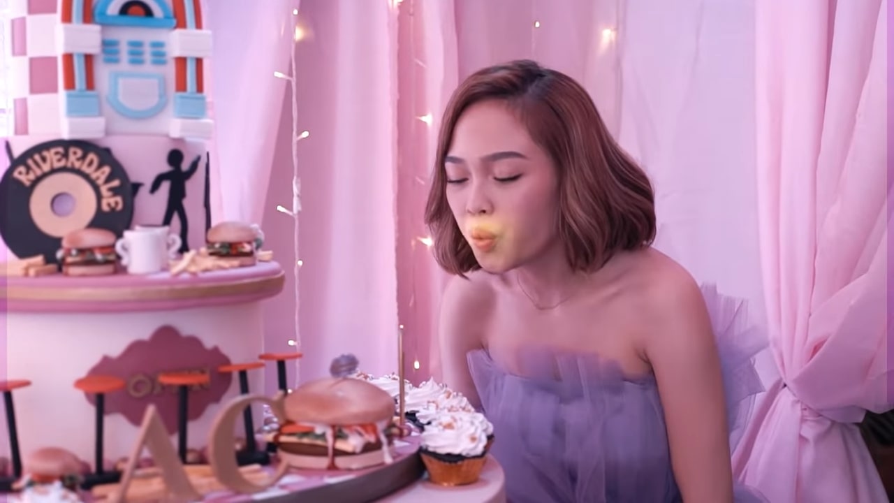 AC Bonifacio - blowing birthday cake