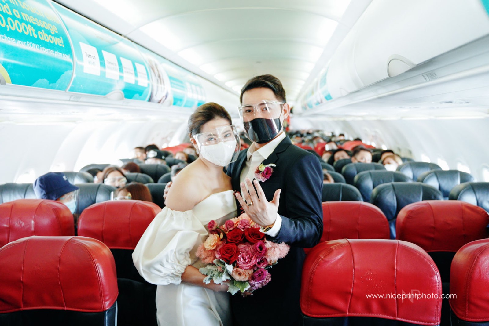 WATCH: Two Flight Attendants Get Married Onboard An Aircraft