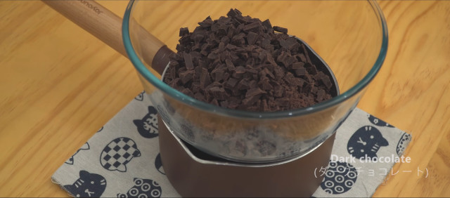 Chocolate-dipped ice cream recipe: Melt dark chocolate pieces.