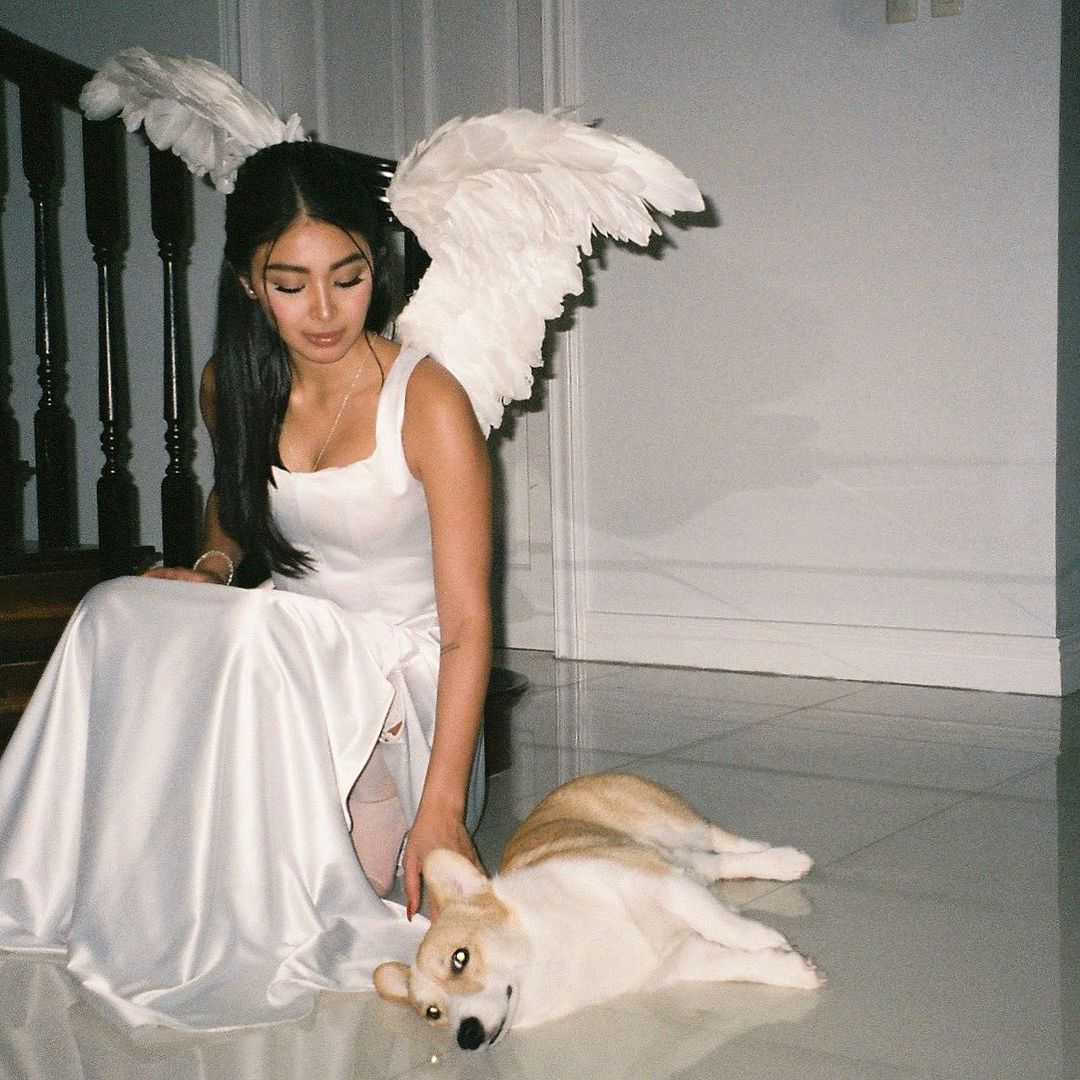 Vintage Instagram filtered photo of Nadine Lustre with her dog