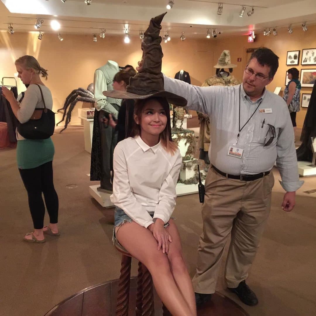 Kathryn trying the Sorting Hat