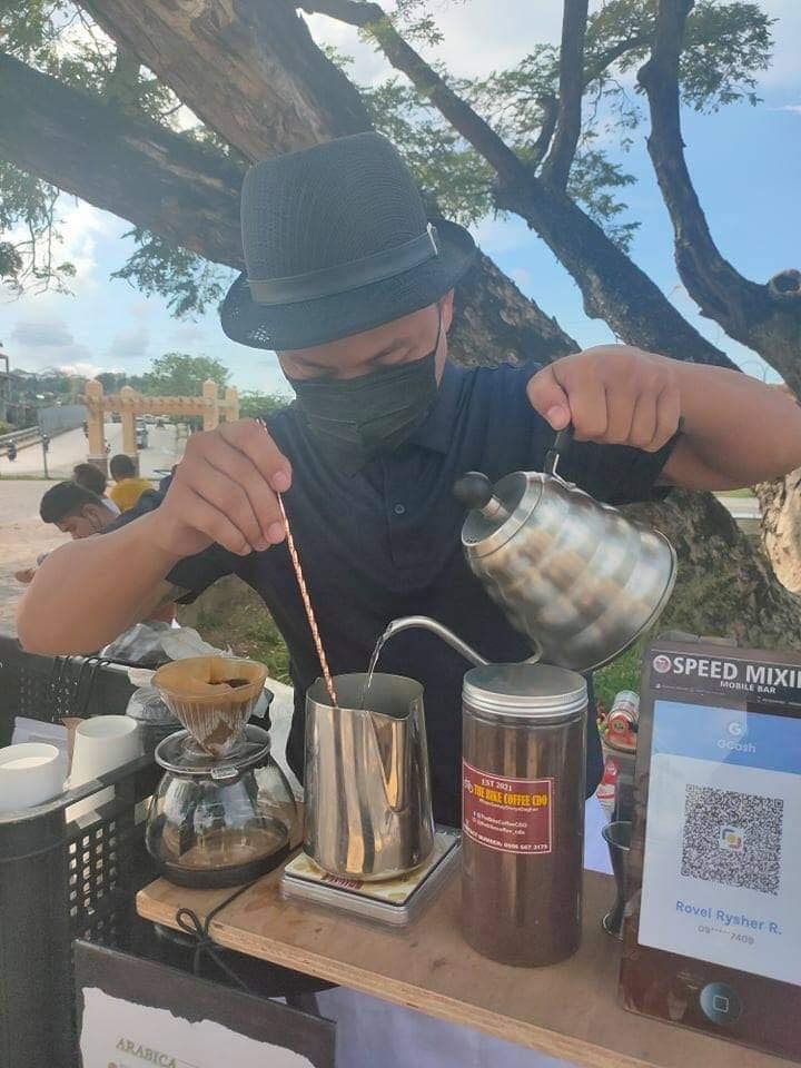 Cocoy of The Bike Coffee CDO making coffee