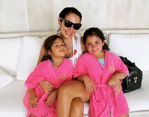 Ruffa posing with her daughters after a day in the beach