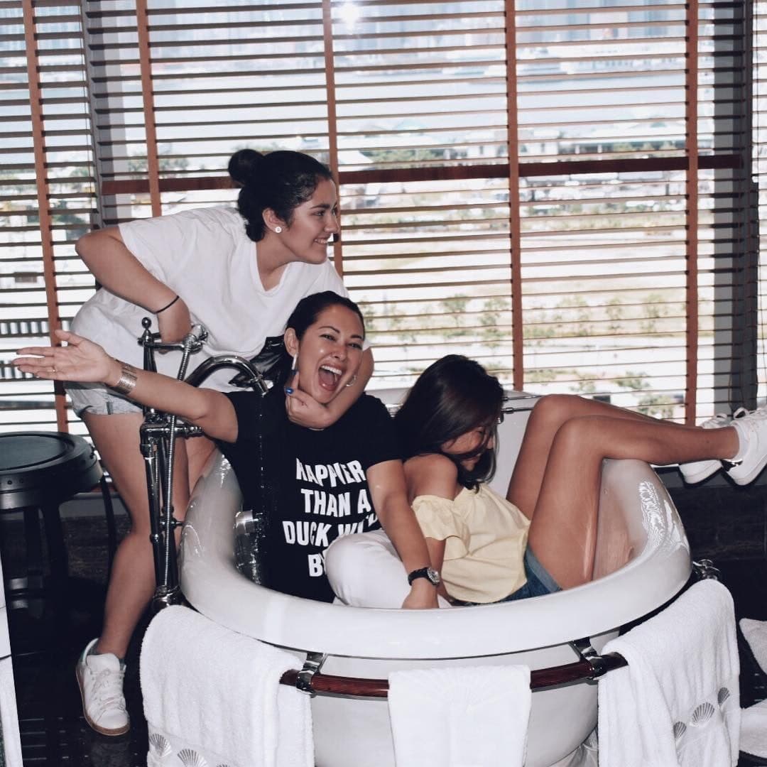 Ruffa and her daughters playing around the bath tub