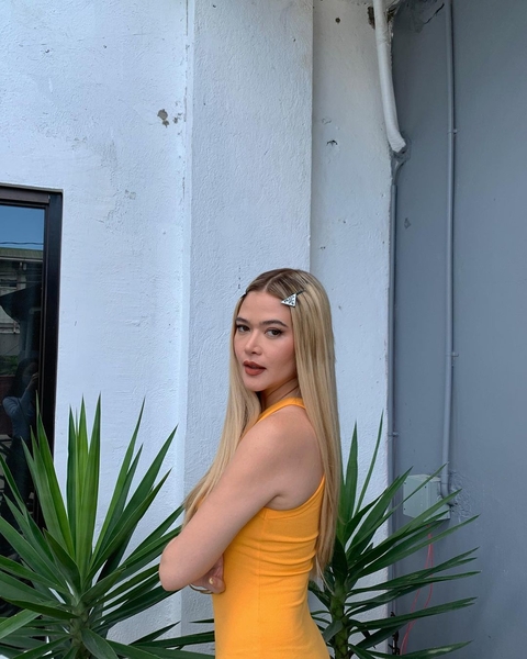 Bella Padilla wearing a yellow dress