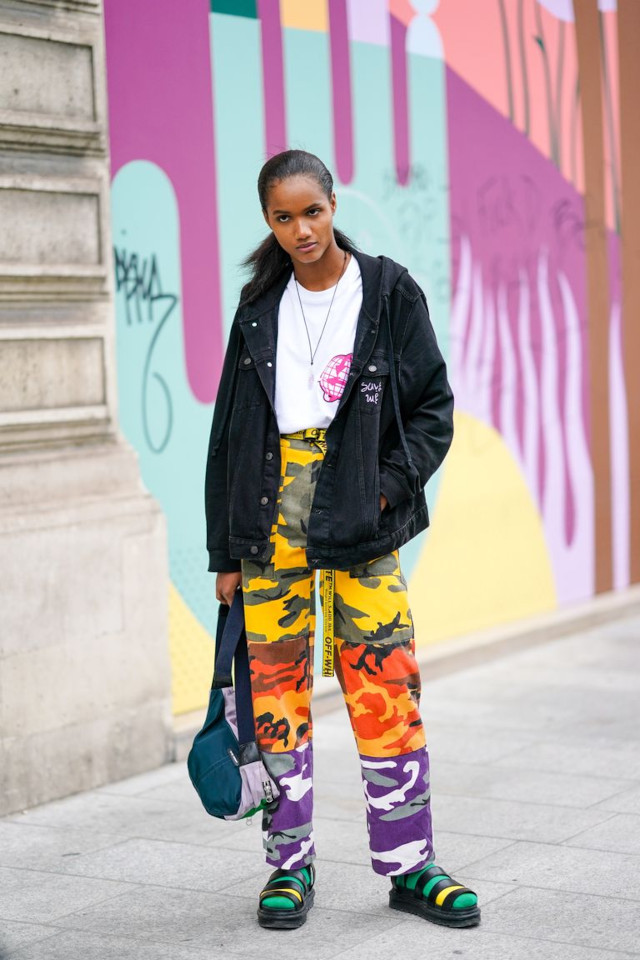 Woman wearing colorful socks and sandals