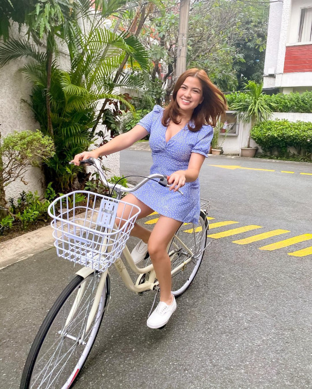 Alexa Ilacad outfit: Dress and sneakers