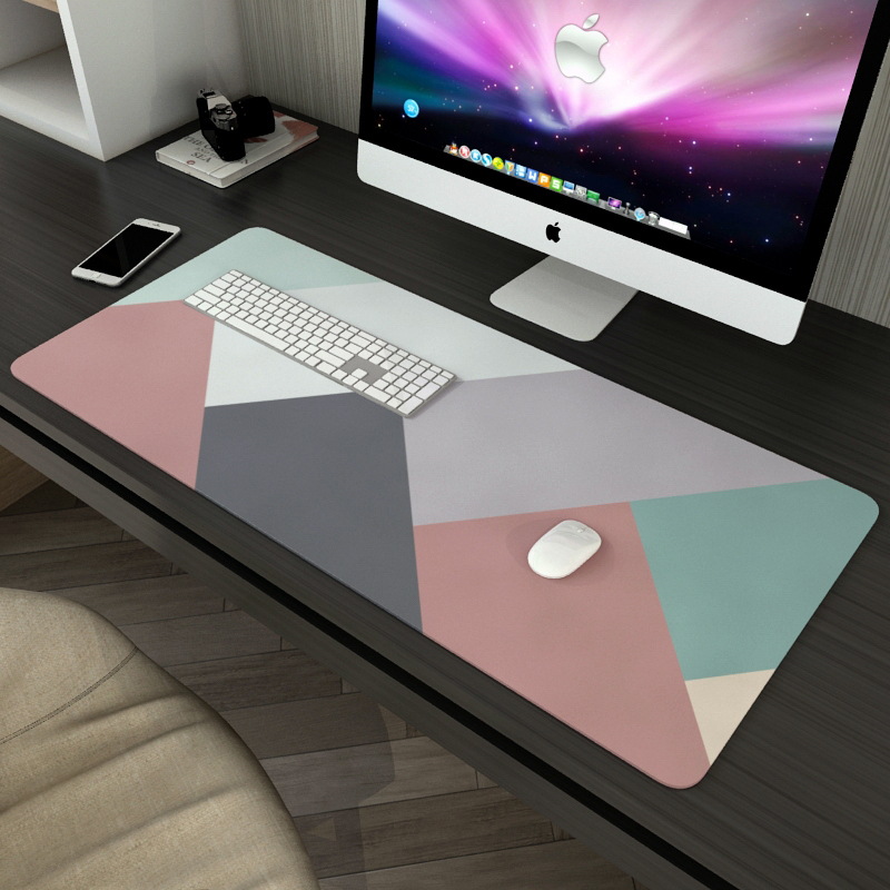 desk mat in multicolored geometric pattern