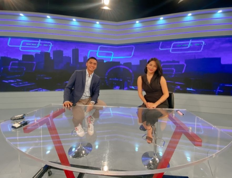 Pinay courtside reporter and sports anchor in studio