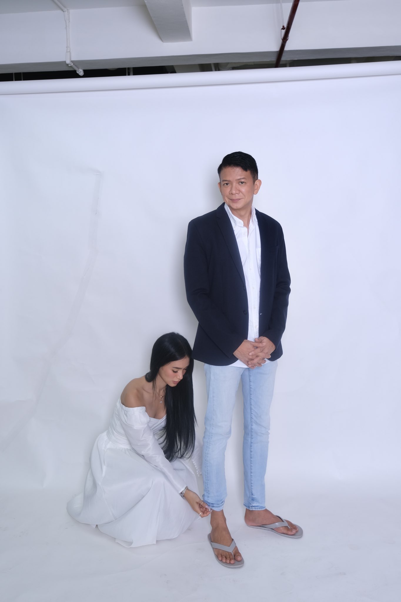 Chiz Escudero being styled by Heart Evangelista in a photoshoot