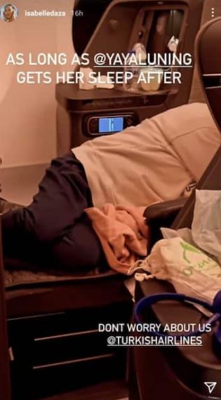 Yaya Luning sleeps on the plane