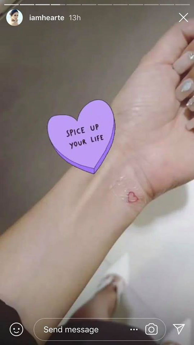 heart evangelista tattoo