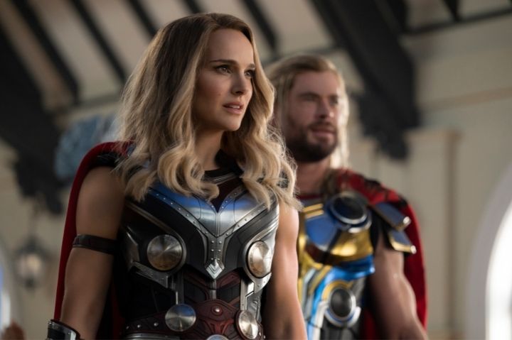 Mighty Thor and Thor facing off against someone in 'Thor: Love and Thunder'