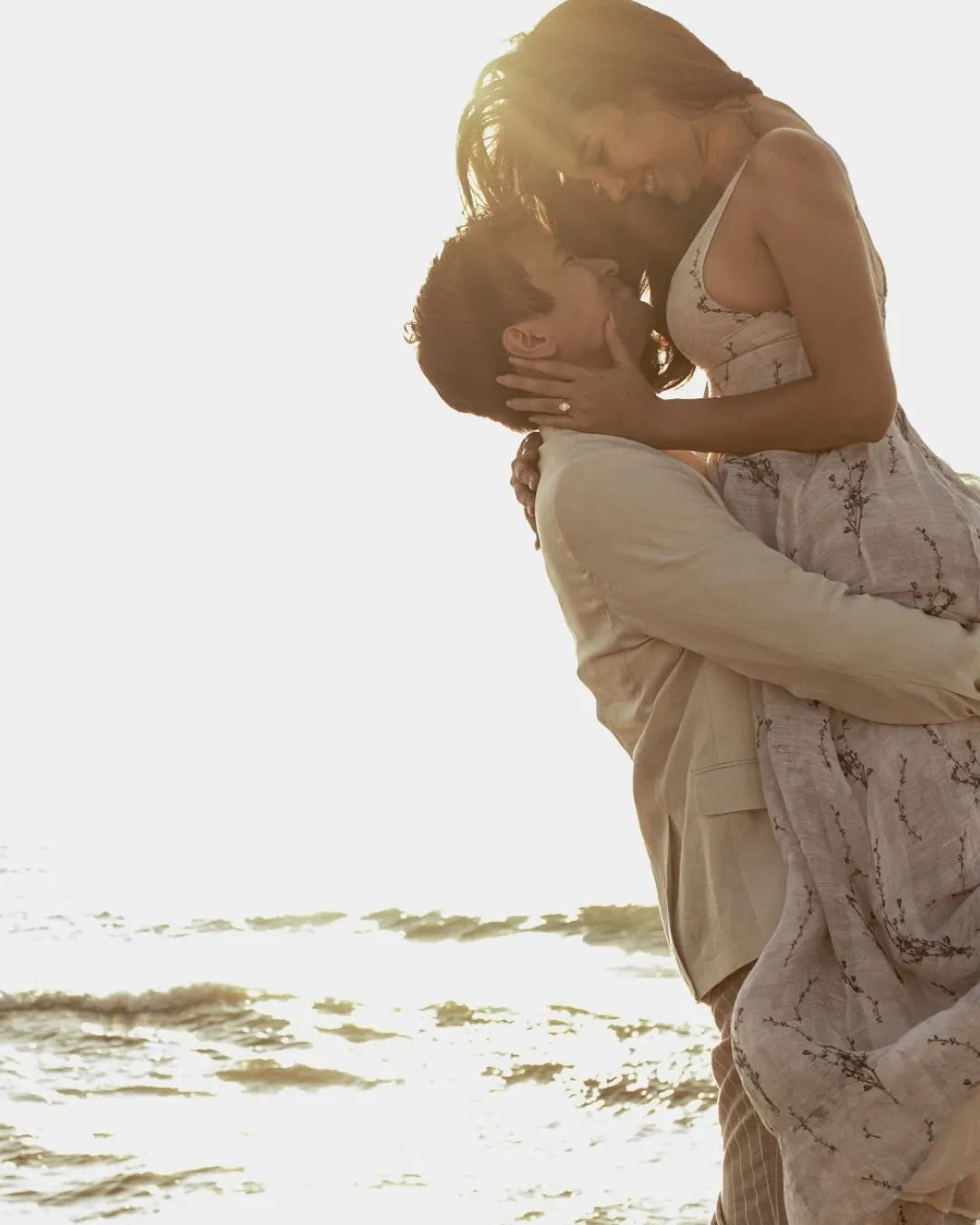 catriona gray sam milby engagement photo beach hug