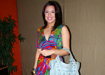 Everyday Essentials In Nikki Gil's Bag