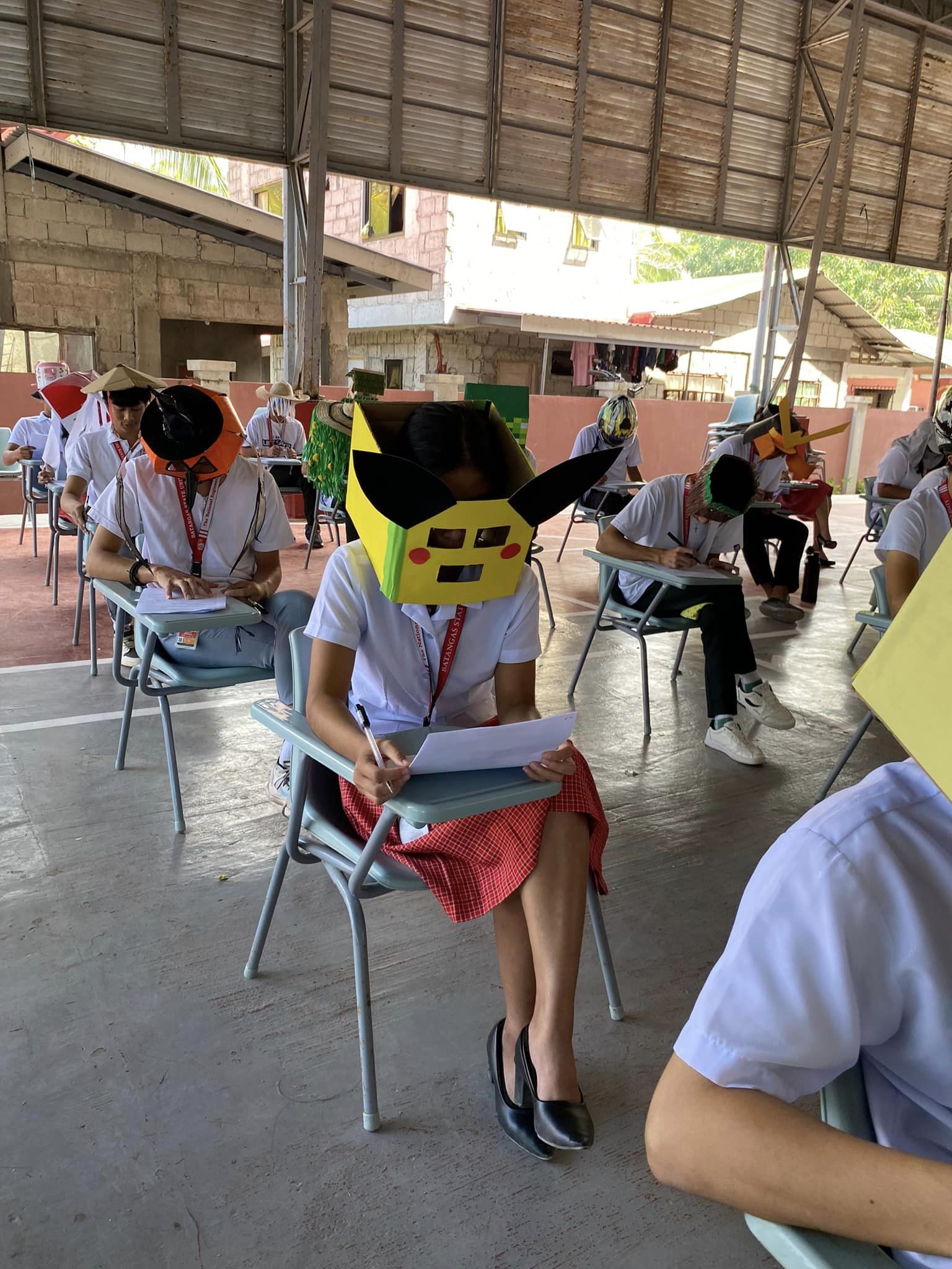 The Real Reasons These Students Wore 'Anti-Cheating' Hats to An Exam