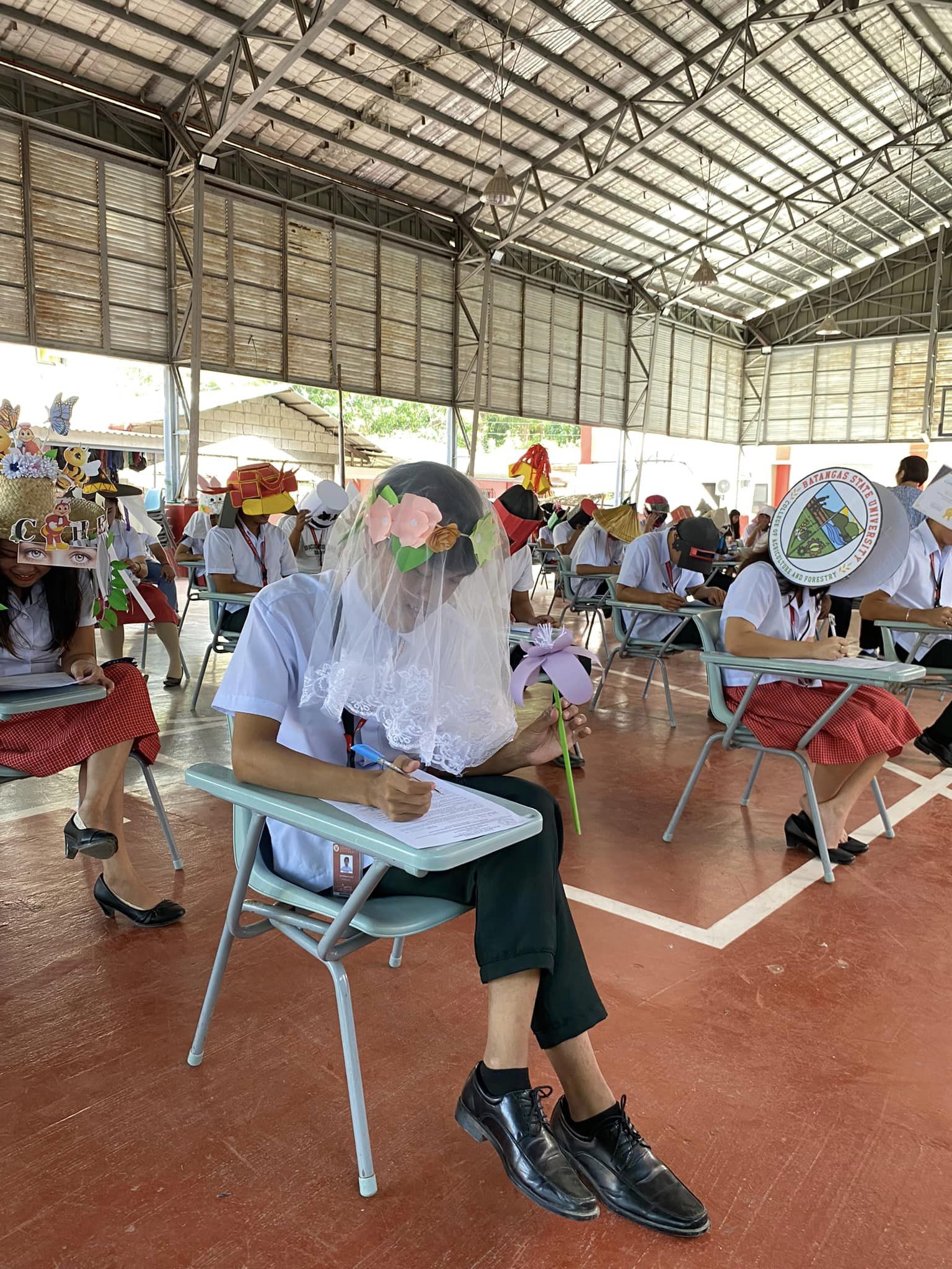 The Real Reasons These Students Wore 'Anti-Cheating' Hats to An Exam