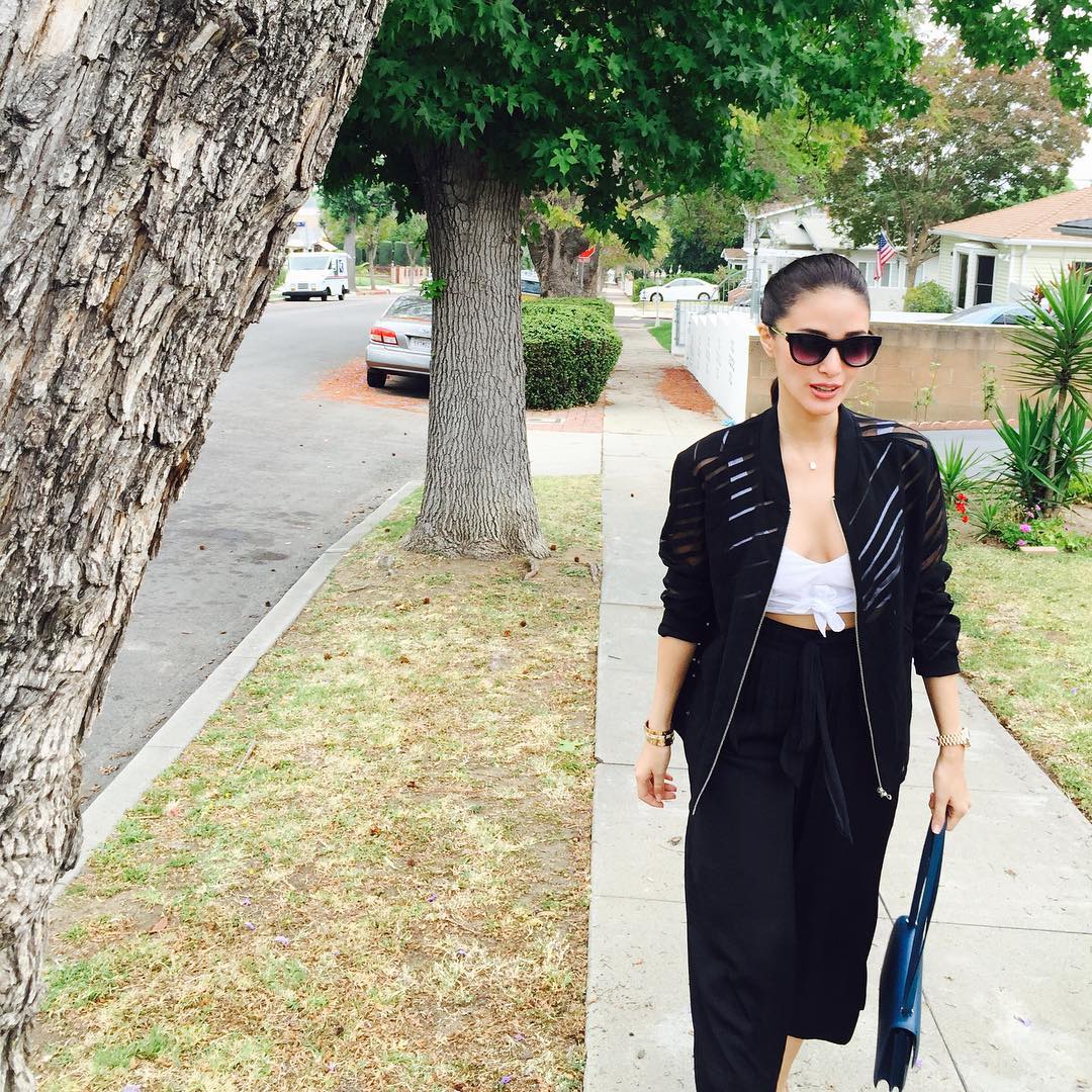 Heart Evangelista wears a black blazer jacket from Off-White