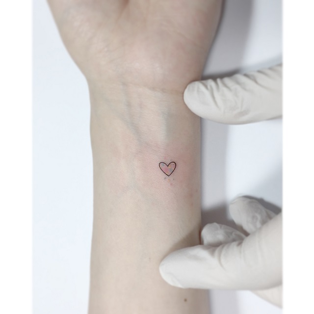 10 Dainty Wrist Tattoos If You Want A Subtle, Minimalist Ink