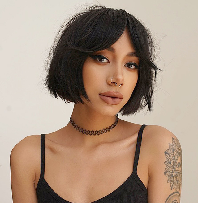 10 Short Haircuts With Curtain Bangs That'll Change Your Look