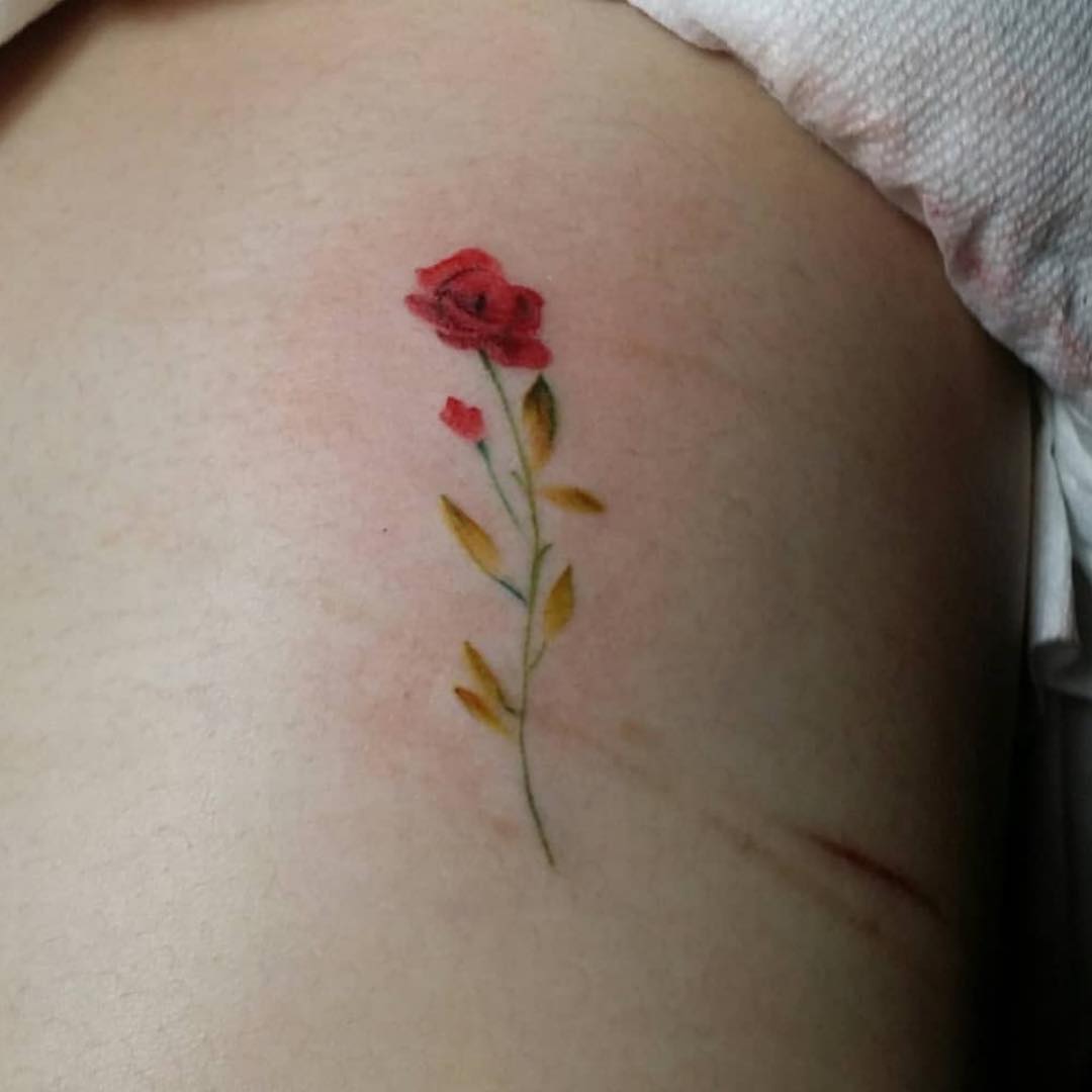 Sofia Andres Watercolor-Style Rose tattoo