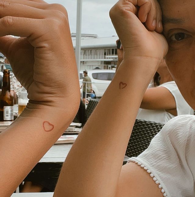 Sofia Andres Heart Outline tattoo on right wrist