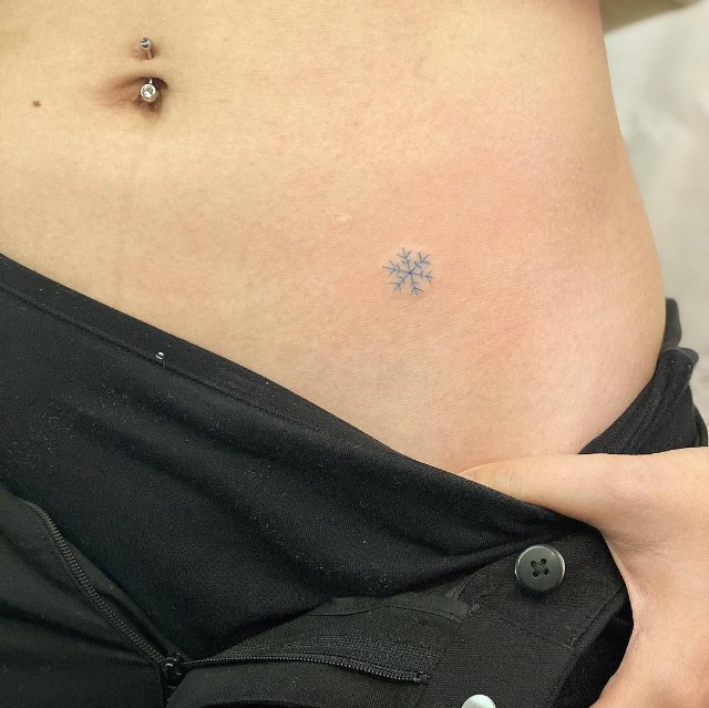 hip tattoo minimalist design: Snowflake