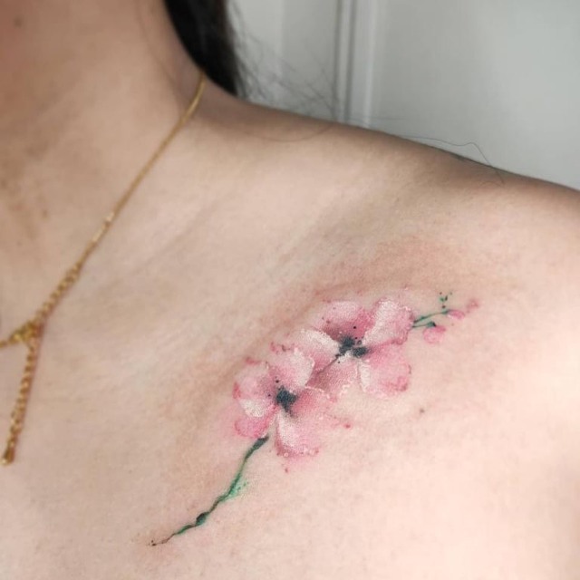 10 Elegant Watercolor Flower Tattoos You'll Want As Your Next Ink