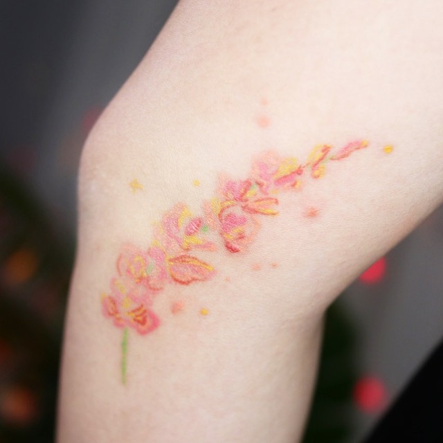 watercolor flower tattoo designs