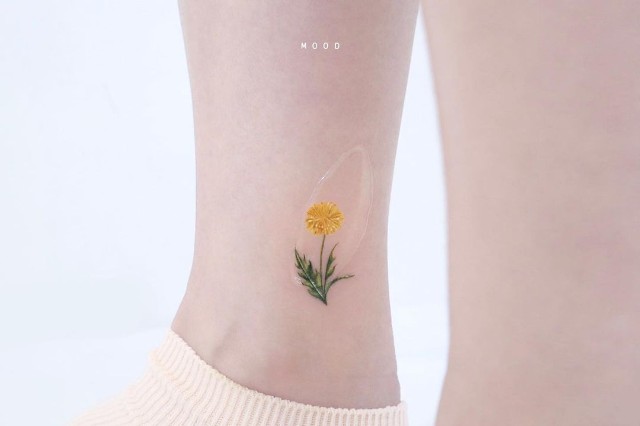 minimalist flower tattoo