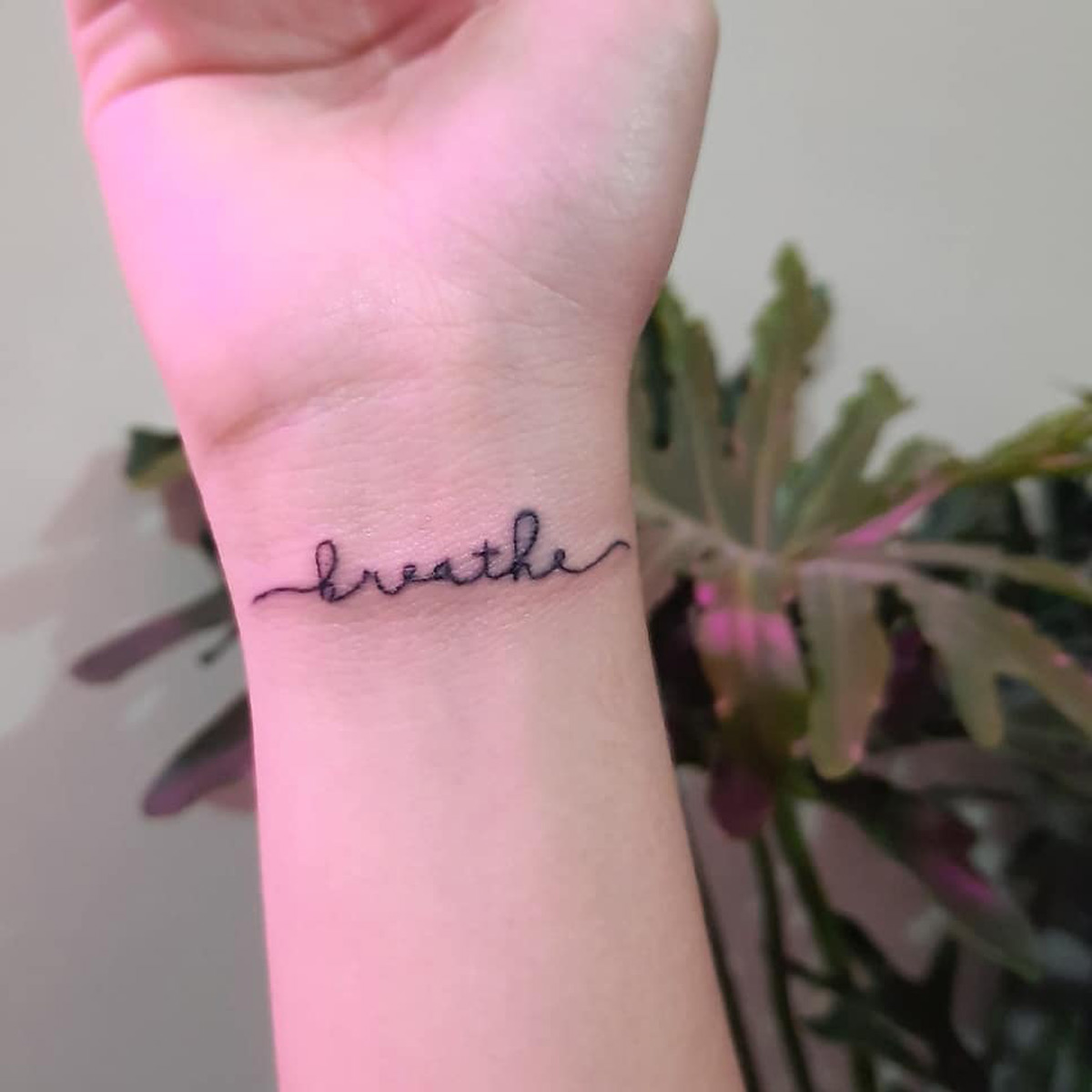 Small Tattoos That Prove How Powerful One Word Can Be