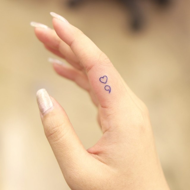 10 Small Hand Tattoos With Meanings You'd Want To Get Inked