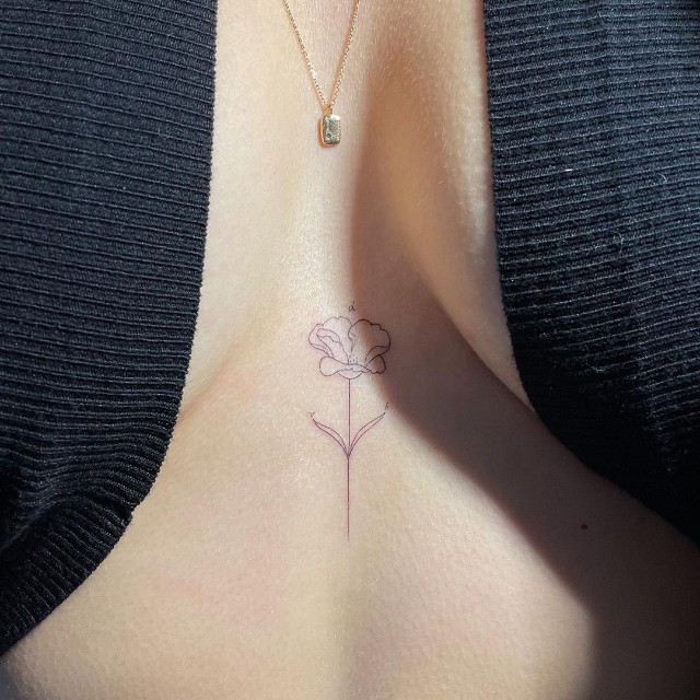 Sarah may want to consider a minimalist design for her sternum tattoo.