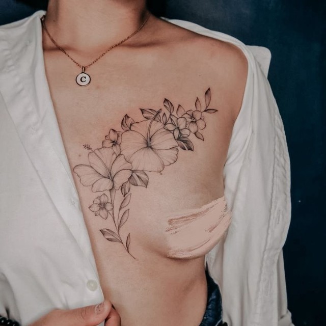 40 Boob Tattoo Ideas For Women Sternum Tattoos  TattooTab
