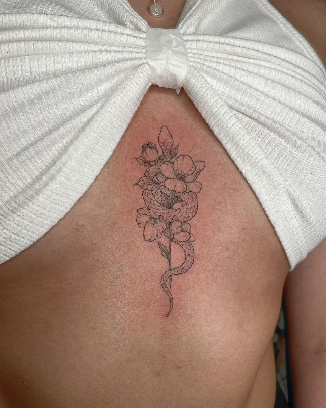Black snake sternum tattoo  Thanks  Rydelreib Tattoo  Facebook