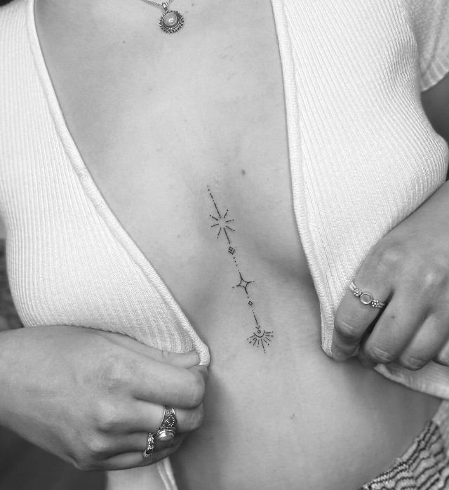 Check out these 36 minimalist tattoo designs that will catch your inspiration for tiny sternum tattoo designs and other minimalist tattoos.