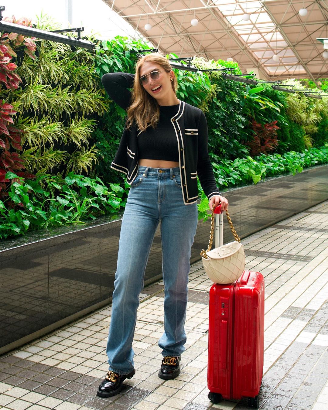 Look: Sofia Andres' Travel Outfits In Singapore Wearing Tory Burch