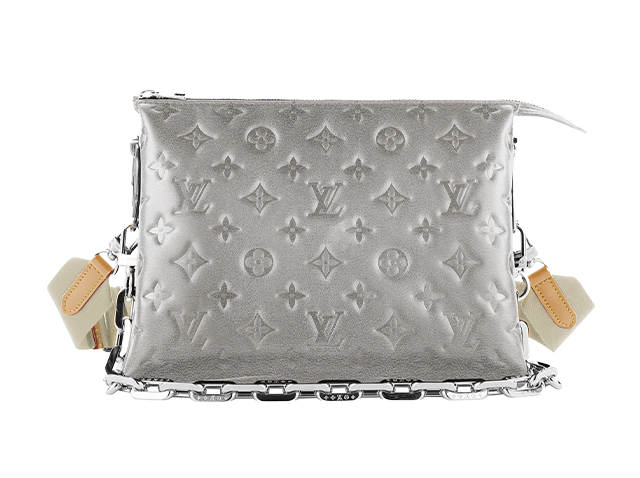 My chic new cuddle buddy. Meet my Coussin! @louisvuitton