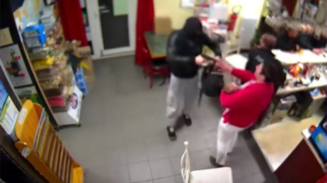 Watch: Woman Fights Off Robber to Protect Her Customer's Baby