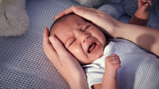 Here's What You Could Be Doing That's Stopping Baby From Sleeping Through the Night