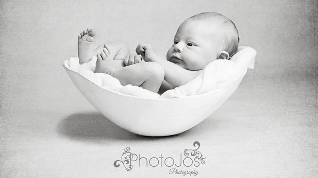 This Photographer is Taking Pics of Newborns Nestled in a Cast of Their Moms' Bellies