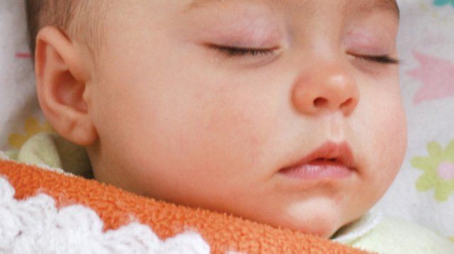 You Should Stop Swaddling Baby at 2 Months, Say Experts